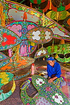 Master Kite-maker constructing his world famous Kites, Kota Bharu, Kelantan State, Malaysia, 2008 image Model and Property released