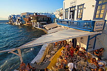 Looking down on cafe scene along Little Venice, Mykonos (Hora), Cyclades Islands, Greece, 2010