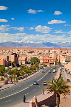 Road heading towards Atlas mountains and through the town of Quarzazate, Morocco, 2011. No release available.