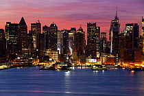 Midtown Manhattan skyline at night across Hudson River, New York, USA 2009