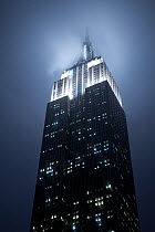 Looking up at the Empire State Building on a rainy evening, Manhattan, New York City, USA 2009. No release available.