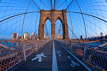 Wide angle view of Brooklyn Bridge looking towards downtown Financial district of Manhattan, New York City, USA 2009
