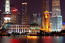 New Pudong skyline at night, looking across the Huangpu River from the Bund, Shanghai, China 2010