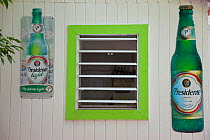 Local beer advertising in the Dutch capital of Philipsburg, Netherlands Antilles, St Martin, Leeward Islands, Lesser Antilles, Caribbean, West Indies 2008