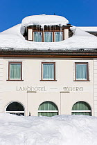 Deep winter snow on a rooftop in St. Moritz, Upper Engadine, Oberengadin, Graubunden region, Swiss Alps, Switzerland, 2009