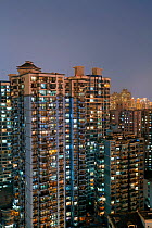 Apartment buildings at dusk in Central Shanghai, Shanghai, China, 2010. No release available.