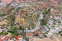 Aerial photograph of the Tufa rock formations and landscape including the Rock Church of St John the Baptist in Cavusin, Cappadocia, Anatolia, Turkey, 2008