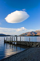 Cloud formation and wooden jetty at Barrow Bay landing, Derwent Water, Lake District National Park, Cumbria, UK November 2008