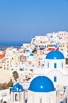Blue domed churches in the village of Oia (La), Santorini (Thira), Cyclades Islands, Aegean Sea, Greece, 2010