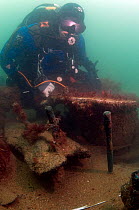 Maritime archaeologist on the wreck of HMS Pomone, a 38 gun Leda class frigate. Sank in 1805 on the Needles. Isle of Wight, August 2011.