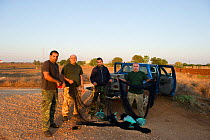 Sovereign Base Area Police at Deleleia with seized illegal trapping equipment from dawn raids, Cyprus, September 2011