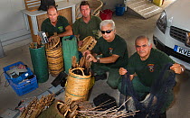 Game Fund anti trapping team with seized trapping equipment including limesticks, sound devices and mist nets Cyprus, September 2011