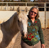 Wild horse / mustang called Mica, rounded up from Adobe Town Herd Management Area in Wyoming and adopted by photographer Carol Walker (pictured). Colorado, USA.