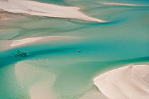 Aerial view of Whitehaven Beach with small boat. Whitsunday Island, Coral Sea, Pacific Ocean, August 2011
