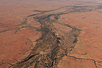 Aerial of Umbum Creek leading to Lake Eyre. Desert, part of the Anna Creek property, South Australia, June 2011