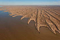 Aerial of Simpson Desert Regional Reserve where  lakes amongst the sand dunes. Normally dry, the lakes only have water during a very wet season, South Australia, June 2011