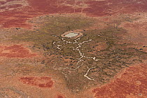 Aerial of Dam in the Strzelecki Desert for cattle just out of Birdsville belonging to Pandie Pandie Station. Dam water comes from bore water from the Great Artesian Basin, South Australia, June 2011