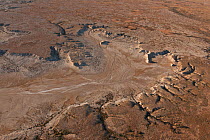 Aerial of desert land going towards Lake Eyre from the direction of William Creek, South Australia, June 2011