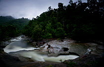 Babinda Boulders, a creek popular as a swimming hole in tropical rainforest, near Cairns, Queensland, Australia