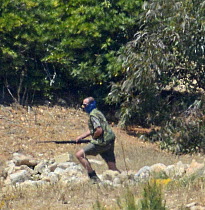 Masked hunter in Foresta 2000 reserve, Malta, during Bird Life Malta Springwatch Camp, April 2013 (Very small file) EDITORIAL USE ONLY