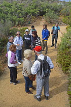 Maltese BirdLife members taking a tour of Ghadira Nature Reserve, led by Ray Veller the warden, during BirdLife Malta Springwatch Camp, Malta, April 2013