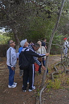 Maltese BirdLife members taking a tour of Ghadira Nature Reserve, led by warden, Ray Vellerduring BirdLife Malta Springwatch Camp, Malta, April 2013