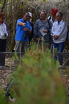 Maltese BirdLife members taking a tour of native tree nursery, Ghadira Nature Reserve, led by Ray Veller, the warden, during BirdLife Malta Springwatch Camp, Malta, April 2013