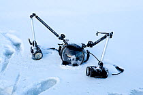 Underwater camera housing and strobes in snow, Arctic circle Dive Center, White Sea, Karelia, northern Russia