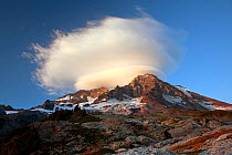 Lenticular cloud over Mount Rainier as seen from the Pyramid Peak Backcountry area of Mount Rainier National Park. Washington, USA, September 2012.