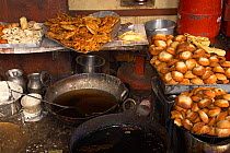 Sweet breads and other street food for sale at Bhaktapur market, Kathmandu, Nepal