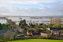 View from Barrow Mump of extensively flooded Lower Salt Moor and North Moor, cutting off the A361 road between Burrowbridge in the foreground and East Lyng after weeks of heavy rain, Somerset Levels,...