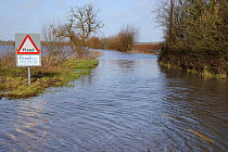 Severely flooded and closed road on Curry Moor between North Curry and East Lyng after weeks of heavy rain, Somerset Levels, UK, January 2013.
