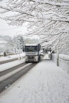 Lorry on the road in severe snow conditions, Box, Wiltshire, UK, January 2013
