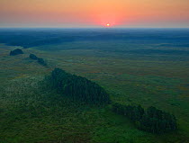 Sunrise over mineral islands in the Muraka bog in Eastern Estonia. August 2011.