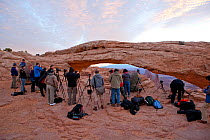 Photographers at Mesa Arch waiting for sunrise. Canyonlands National Park, Utah, October 2012.