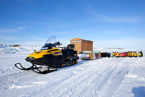 Ice camp is constructed from several wooden cabins fitted with sledges, which are easily moved between diving sites by snowmobile, Arctic circle Dive Center, White Sea, Karelia, northern Russia March...