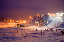 lluminated ski slopes at night, Ruka, Lapland, Finland