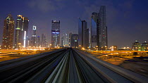 Timelapse looking out of the front of a train on the elevated Dubai Metro System, Dubai, United Arab Emirates, 2011.