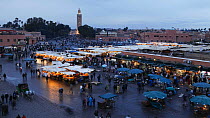 Timelapse from day to night looking over Djemaa el-Fna market, Marrakech, Morocco, 2011.