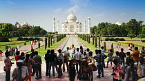 Timelapse of tourists having their photographs taken in front of the Taj Mahal, Taj Mahal UNESCO World Heritage Site, Agra, Uttar Pradesh, India, 2011.