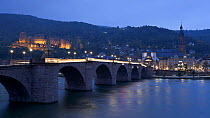 Timelapse from day to night of lights coming on on Heidelberg Castle and on the Old Bridge over the River Neckar, Heidelberg, Baden-Wurttemberg, Germany, 2011.
