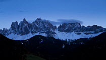 Timelapse from day to night of lenticular cap clouds forming around the summit of Geisler Spitzen (3060m), Val di Funes, Dolomites, Italy, 2011.
