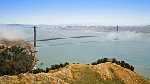 Timelapse of advection fog rolling in under the Golden Gate Bridge, San Francisco, California, USA, 2011.