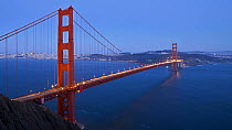 Timelapse from day to night of vehicles driving across the Golden Gate Bridge, San Francisco, California, USA, 2011.