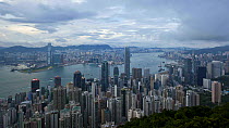Timelapse from day to night of Victoria Harbour and Hong Kong city skyline from Victoria Peak, Hong Kong, China, 2011.