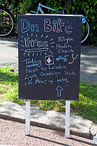 Dr. Bike - blackboard advertising free bicycle health check at London Green Fair (previously Camden Green Fair) England, UK, June 2012