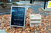 Farm Direct notice board on the pavement, advertising the sale of local foods from their shop, Highbury, London Borough of Islington, England UK