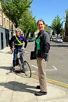 Green Party Activists one on bike, Highbury West Ward, Islington North, England UK, May 2010