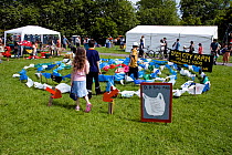 Children in old plastic bag maze made from recycled plactic bags, Camden Green Fair, England, UK, June 2006