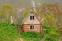 Ranger station in the Valley of the Geysers in summer. Kronotsky Zapovednik Nature Reserve, Kamchatka Peninsula, Russian Far East, June 2006. Sequence 1 of 3.